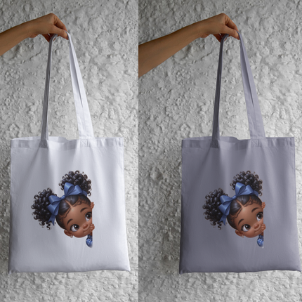 Peekaboo Girls #4 Heat Transfers by Style Junction Custom Digital Designs feature a playful girl peeking with vibrant curls and a blue bow.