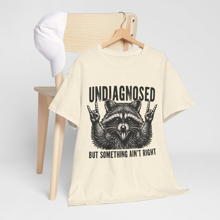 Undiagnosed Raccoon Tee — "But Something Ain't Right" Funny Graphic T-Shirt