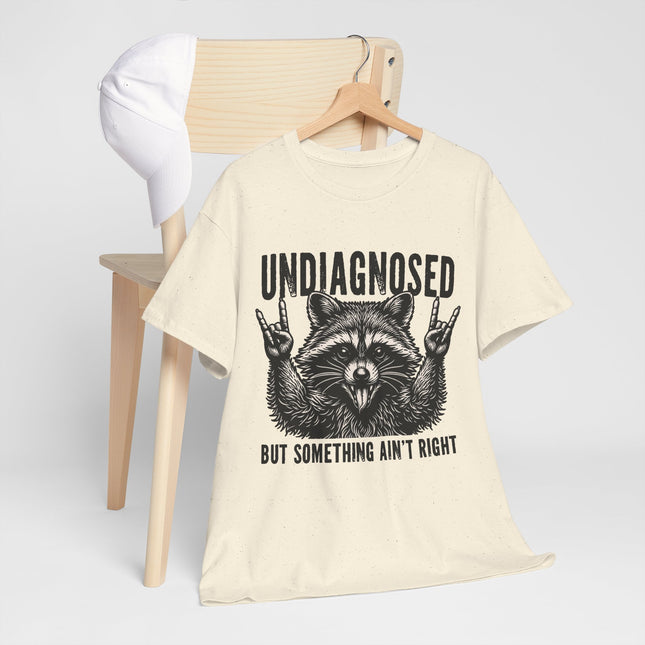 Undiagnosed Raccoon Tee — "But Something Ain't Right" Funny Graphic T-Shirt