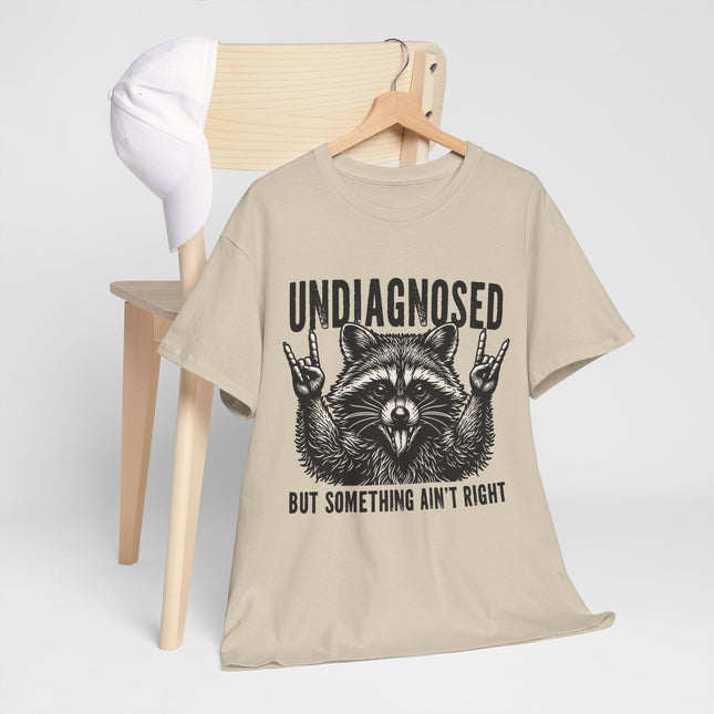 Undiagnosed Raccoon Tee — "But Something Ain't Right" Funny Graphic T-Shirt